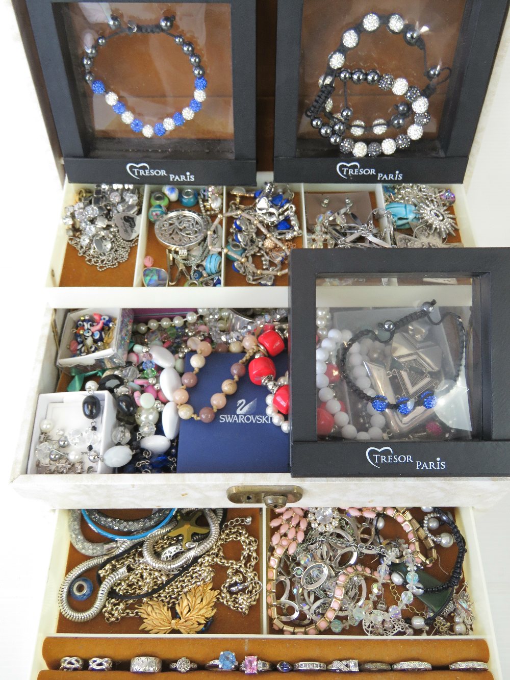 A quantity of assorted jewellery including some items marked 925, Swarovski, glass beads, rings,