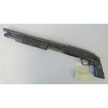 A deactivated (EU Spec) American 12 bore Mossburg pump action police short barrel shotgun.