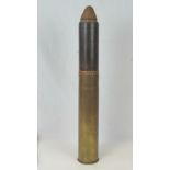 An inert British WWI 3" cannon round with projectile and fuse, dated 1914. Overall height 60cm.