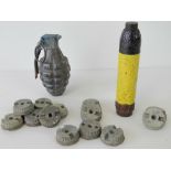 An inert US grenade, an inert WWII German grenade and fourteen Mills Grenade bases.