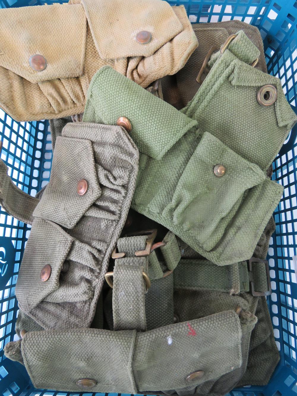 Twelve WWII 37 pattern pouches.