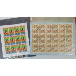 Eleven complete and uncut sheets of Cold War era stamps.