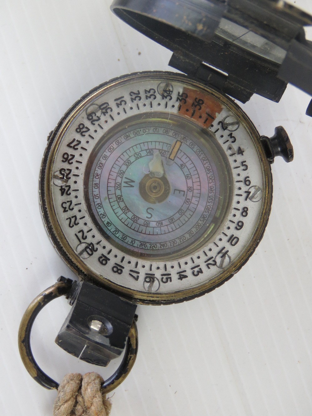 A WWII British MKIII compass by T.G.Co Ltd, numbered 201403, marked with broad arrow and dated 1944. - Image 3 of 4