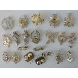 Twenty-one 'Staybright' army badges mostly by Firmin or Gaunt London; Intelligence Corps,