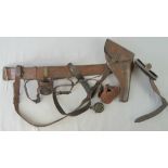 A superb WWI leather Sam Browne belt and fittings including pistol holster, dagger hanger,