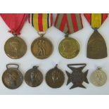 A Belgian 1914-18 medal with ribbon and 1914 medal without ribbon,