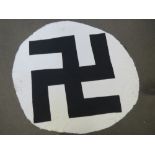 A WWII German Swastika flag centre having been taken as a souvenir by a veteran, approx 157cm wide.