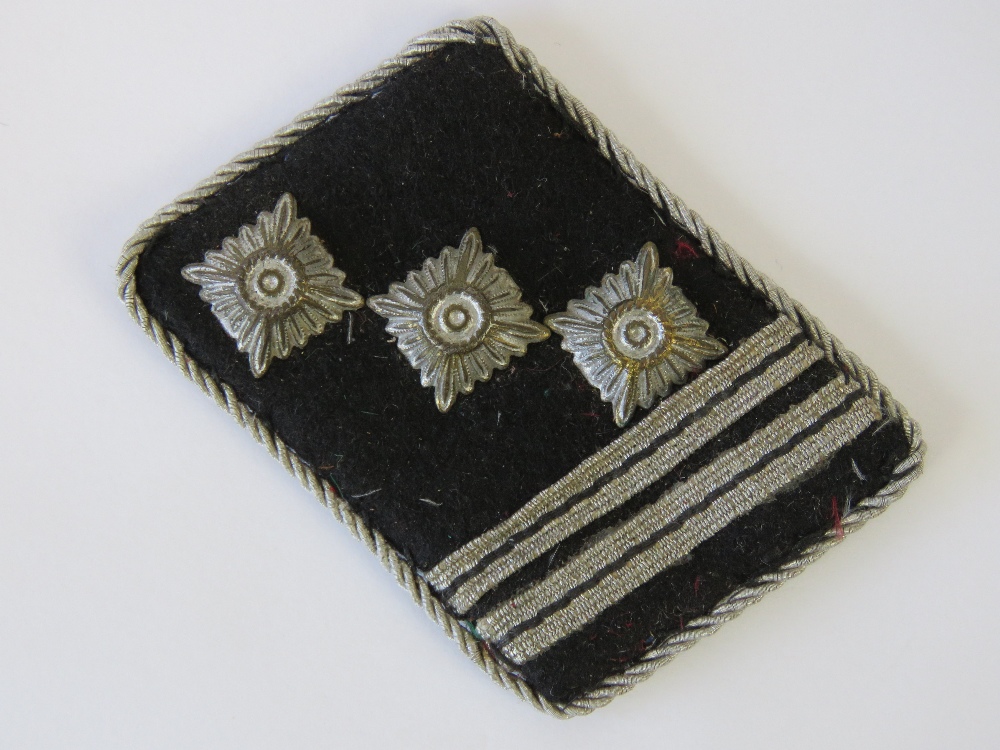 A WWII German Officers collar patch with silver thread embroidery.