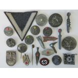 A quantity of WWII German cloth and metal badges including; Wound and Blockage Breaker stick pins,