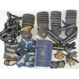 A quantity of assorted RAF cloth badges including gold embroidered emblems,