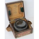 A WWII RAF aircraft compass in transit box, dated 1944 with Air Ministry marks,