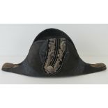A 20th century Naval Officers dress bicorn hat decorated with silver thread oak leaves and acorns