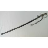 A WWII German sword with engraved oak leaf pattern throughout,