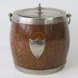 A 1930s nickel plated oak ice barrel wit