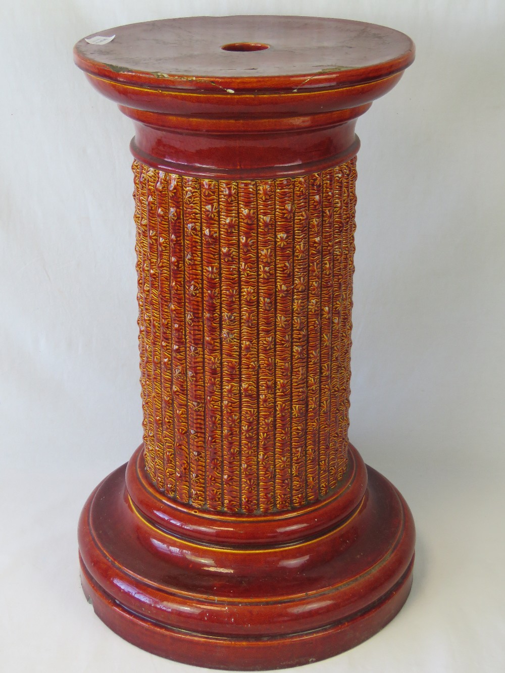 A Victorian glazed short ceramic torcher