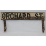 An early 20th century road sign for Orch