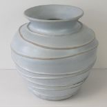A contemporary banded studio pottery flo