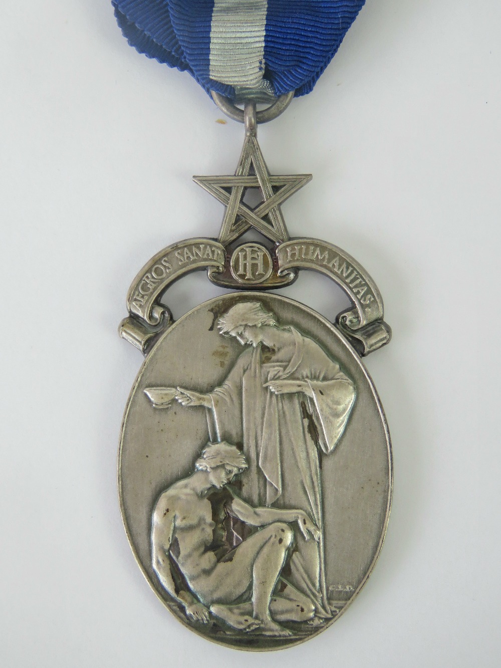 A HM silver Masonic medal presented to '