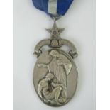 A HM silver Masonic medal presented to '