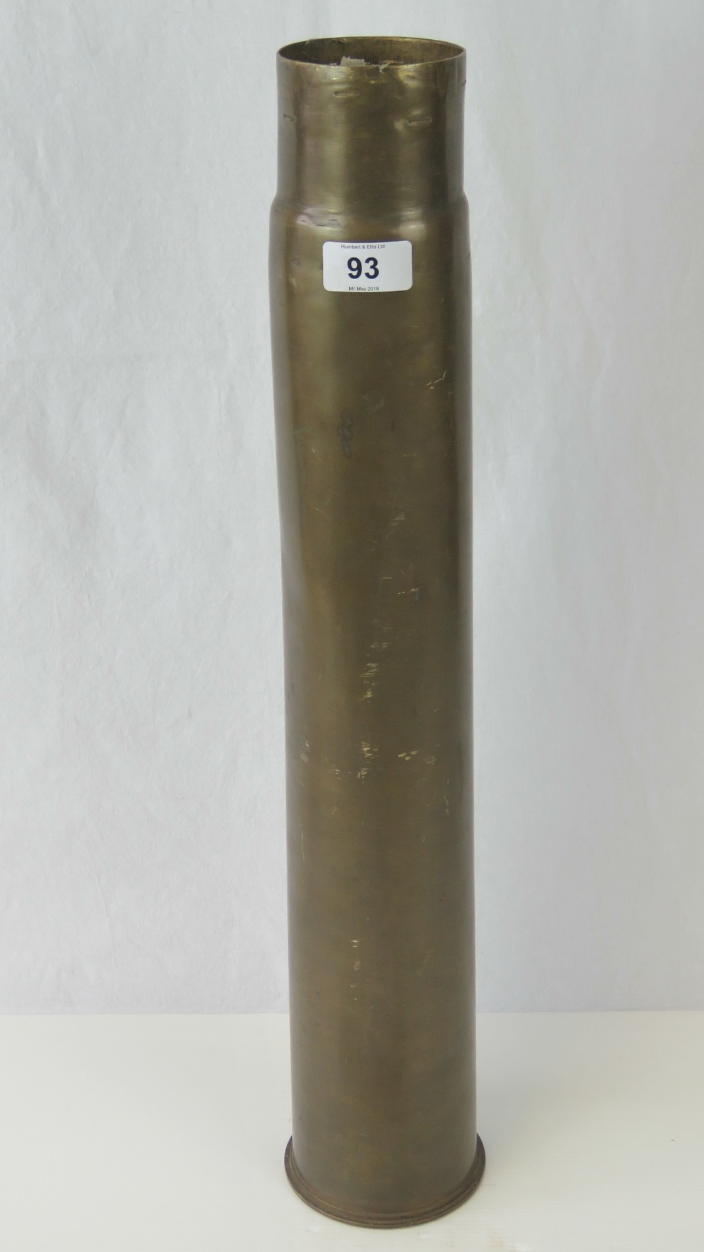 A WWII 3"" cannon brass shell case with U