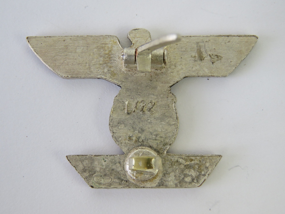 A WWII German Iron Cross bar, marked 'L/ - Image 2 of 2