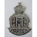A reproduction ARP Warden car badge, 12