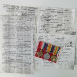 A WWI trio of medals each with ribbons a