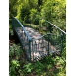 A superb blacksmith made wrought iron bridge made by Cotswold Decorative Ironworks,