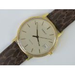 A vintage 18ct gold Tissot Seastar wristwatch c1970s, having silvered dial, yellow metal batons,