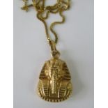 A 9ct gold pendant in the form of a Pharaoh's mask hallmarked 375,