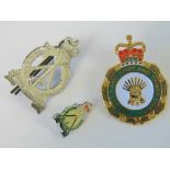 A Royal Pioneers cap badge complete with pin, together with a Royal Pioneers badge,