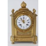 A French mid 19th Century Gilt brass chiming mantle clock. Enameled 3.