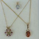 A 9ct gold ruby and diamond set heart pendant on 9ct gold chain,