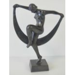 A 20th century Art Deco cast metal figurine, 24cm high.