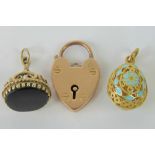 A 14ct gold filigree and enamel 'egg' pendant, 3.