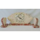 A fine quality marble Art Deco clock garniture set having clockwork movement and Arabic numerals