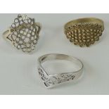 A silver wishbone shaped filigree ring size S, a pierced silver ring size P-Q,