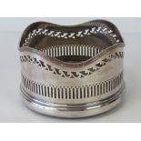 A silver plated and mahogany single wine coaster by Mappin and Webb, 13cm dia.