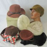 A quantity of felt and faux fur ladies hats.