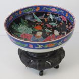 A late 19th / early 20th century Oriental painted stoneware bowl,