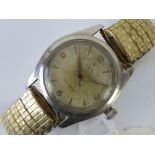 A vintage Rolex Tudor Oyster stainless steel watch c1950's, stamped 7804 to back plate,