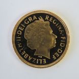 A 22ct gold proof Elizabeth II 2002 shield back full sovereign, 8g,