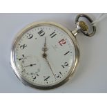 A silver Omega open face pocket watch, top winding,