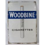 A vintage enamelled tin plate advertising wall sign for Wills Woodbine Cigarettes, 92 x 61cm.