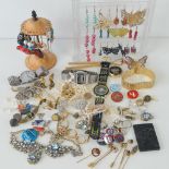 A quantity of assorted costume jewellery including two earring display stands, watches, pendants,