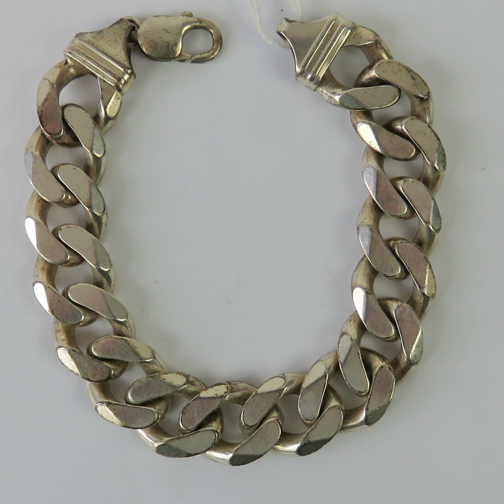 A heavy HM silver men's curb link bracelet, 1.6cm wide, 23.5cm in length, hallmarked 925, 3.18ozt.