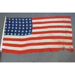 A c1920s stars and stripes flag with fourty-two stars, 92 x 172cm.