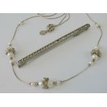 A modern silver and pearl neck chain marked "PZ Israel, 925",