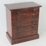 A Victorian apprentice piece chest of five mahogany veneered drawers, 38 x 33cm, slightly a/f.