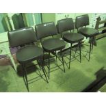 A set of four contemporary swivel top leatherette bar stools.